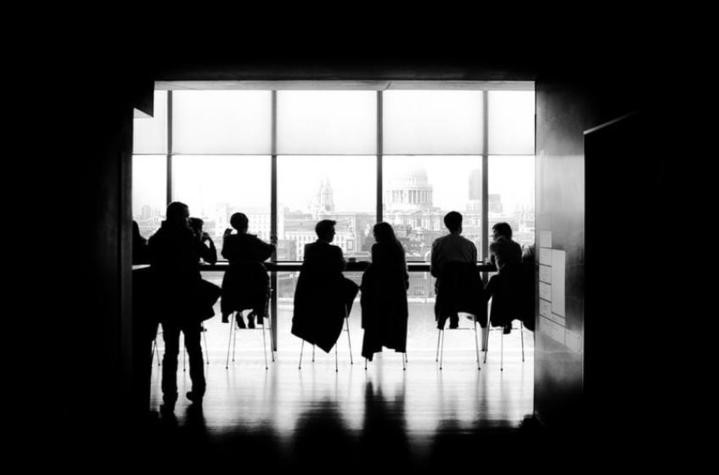 People sitting at a meeting table